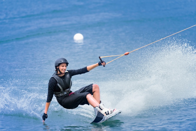 Young woman on wakeboard